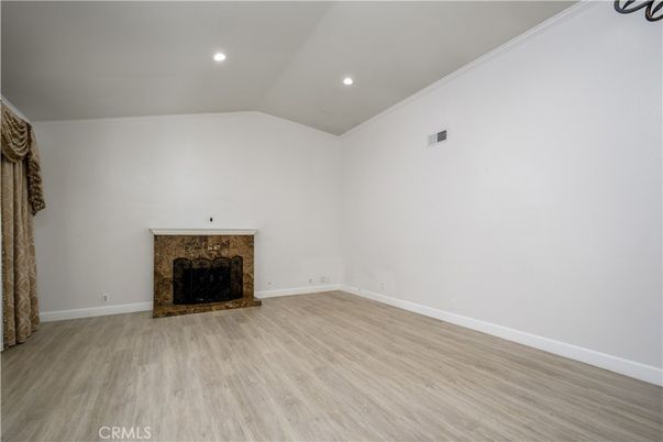 Empty room, Fireplace, Interior, Recessed Lighting, Wood Texture Flooring
