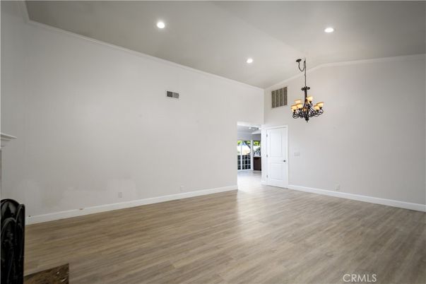 Chandelier, Empty room, Interior, Recessed Lighting, Wood Texture Flooring