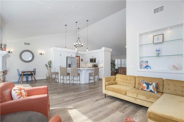 Dining room, Interior, Kitchen, Living room, Pendant Lights, Recessed Lighting, Stainless Steel Appliances, Wood Texture Flooring