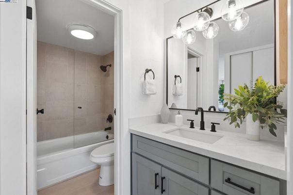 Bathroom, Dual Sink Vanities, Glass Shower, Interior, Wood Texture Flooring