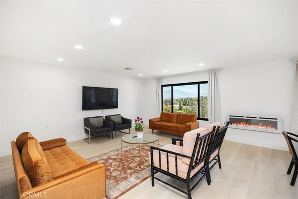 Fireplace, Interior, Living room, Recessed Lighting, Wood Texture Flooring