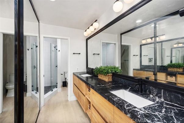 Bathroom, Dual Sink Vanities, Glass Shower, Interior, Wood Texture Flooring