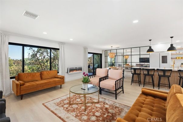Dining room, Fireplace, Interior, Living room, Pendant Lights, Recessed Lighting, Wood Texture Flooring