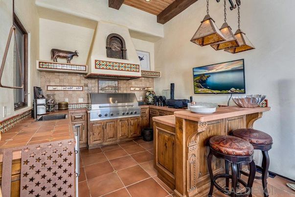 Interior, Kitchen, Pendant Lights, Recessed Lighting, Stainless Steel Appliances, Tile Countertops, Wooden Beams