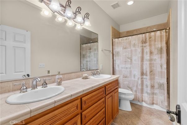 Bathroom, Dual Sink Vanities, Interior, Recessed Lighting, Tile Countertops
