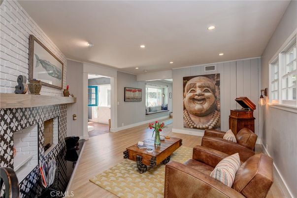 Fireplace, Interior, Living room, Piano, Recessed Lighting, Stone Walls, Wood Texture Flooring