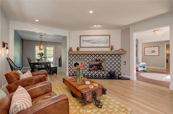 Dining room, Fireplace, Interior, Living room, Pendant Lights, Recessed Lighting, Wood Texture Flooring