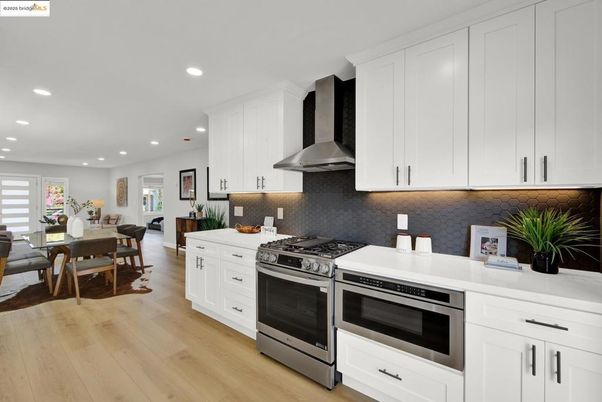 Dining room, Interior, Kitchen, Recessed Lighting, Stainless Steel Appliances, Wood Texture Flooring