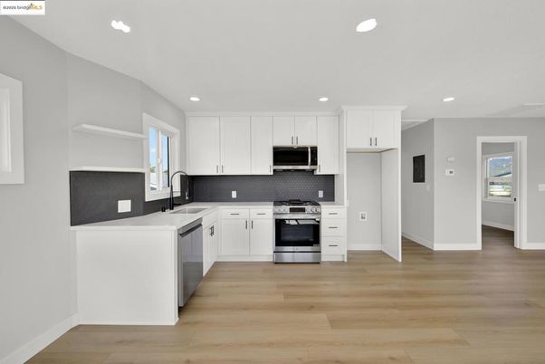 Interior, Kitchen, Recessed Lighting, Stainless Steel Appliances, Wood Texture Flooring