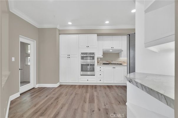 Interior, Kitchen, Recessed Lighting, Stainless Steel Appliances, Wood Texture Flooring