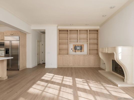 Fireplace, Interior, Kitchen, Recessed Lighting, Stainless Steel Appliances, Wood Texture Flooring