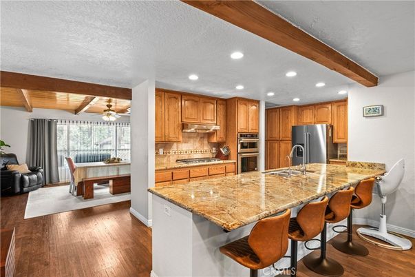 Dining room, Interior, Kitchen, Recessed Lighting, Stainless Steel Appliances, Wooden Beams, Wooden Ceilings, Wood Texture Flooring