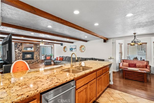 Fireplace, Interior, Kitchen, Living room, Pendant Lights, Recessed Lighting, Stone Walls, Wooden Beams, Wood Texture Flooring