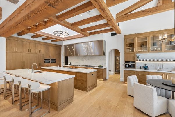 Chandelier, Interior, Kitchen, Marble Walls, Pendant Lights, Recessed Lighting, Stainless Steel Appliances, Wooden Beams, Wood Texture Flooring
