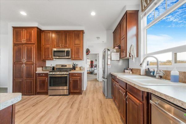 Interior, Kitchen, Recessed Lighting, Stainless Steel Appliances, Wood Texture Flooring