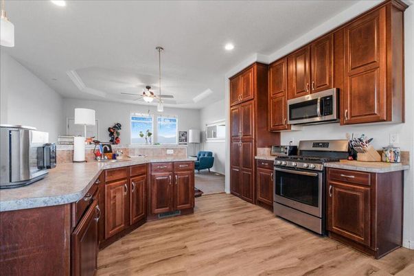 Interior, Kitchen, Recessed Lighting, Stainless Steel Appliances, Wood Texture Flooring