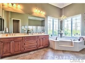 Bathroom, Chandelier, Dual Sink Vanities, Free Standing Baths, Interior, Recessed Lighting