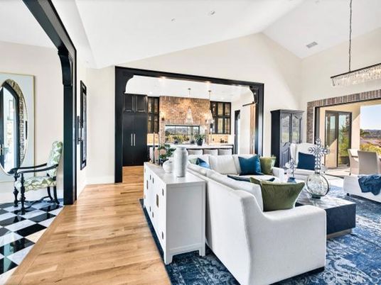 Chandelier, Interior, Kitchen, Living room, Pendant Lights, Recessed Lighting, Stainless Steel Appliances, Wood Texture Flooring