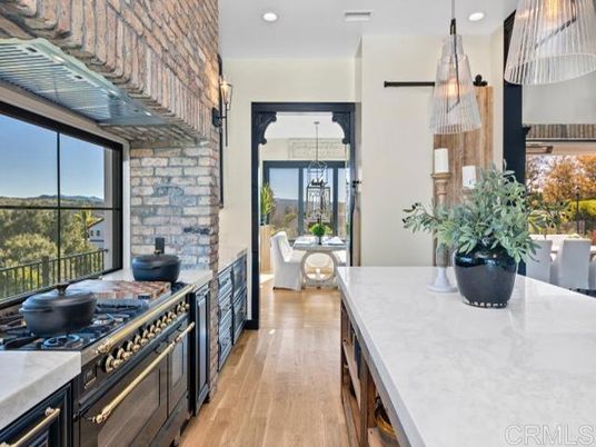 Dining room, Interior, Kitchen, Pendant Lights, Recessed Lighting, Stainless Steel Appliances, Stone Walls, Wood Texture Flooring