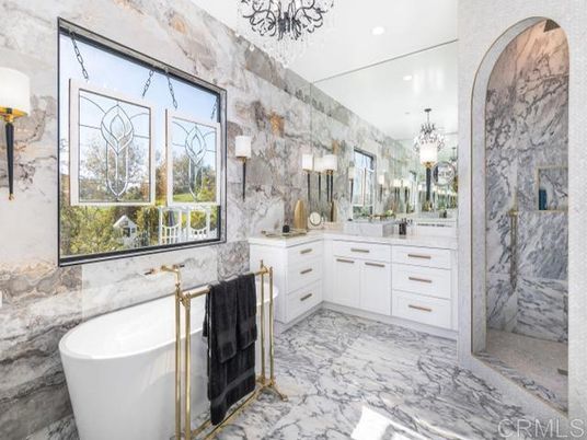 Bathroom, Chandelier, Dual Sink Vanities, Free Standing Baths, Interior, Marble, Marble Walls, Recessed Lighting