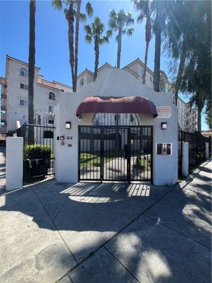Attached, Exterior, Facade, Spanish Mediterranean