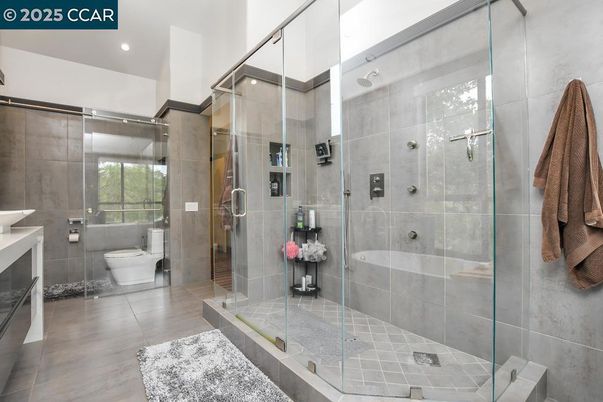 Bathroom, Free Standing Baths, Glass Shower, Interior, Recessed Lighting, Wood Texture Flooring