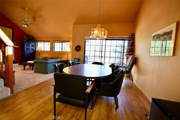 Dining room, Fireplace, Interior, Living room, Pendant Lights, Wood Texture Flooring