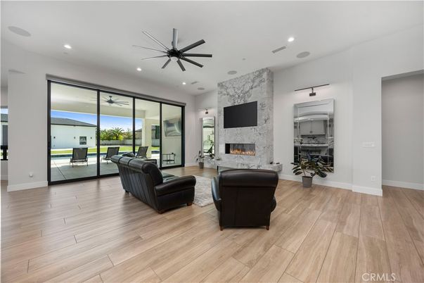 Fireplace, Interior, Living room, Recessed Lighting, Wood Texture Flooring
