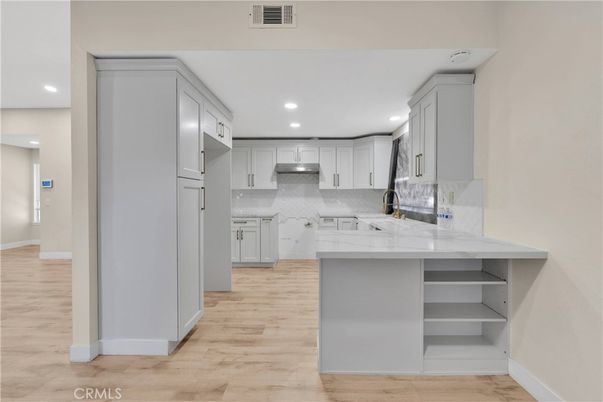 Interior, Kitchen, Recessed Lighting, Stainless Steel Appliances, Wood Texture Flooring
