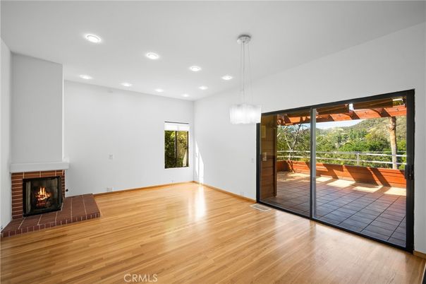 Empty room, Fireplace, Interior, Pendant Lights, Recessed Lighting, Wood Texture Flooring