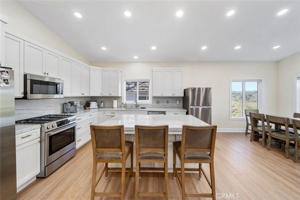 Dining room, Interior, Kitchen, Recessed Lighting, Stainless Steel Appliances, Wood Texture Flooring