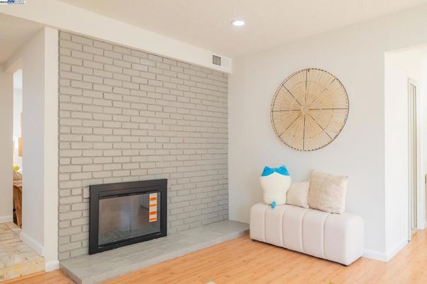 Fireplace, Interior, Recessed Lighting, Stone Walls, Wood Texture Flooring