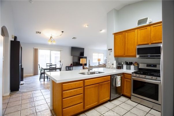 Dining room, Interior, Kitchen, Recessed Lighting, Stainless Steel Appliances, Wood Texture Flooring