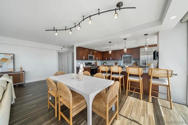 Dining room, Interior, Kitchen, Pendant Lights, Recessed Lighting, Stainless Steel Appliances, Wood Texture Flooring