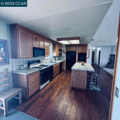 Interior, Kitchen, Tile Countertops, Wood Texture Flooring