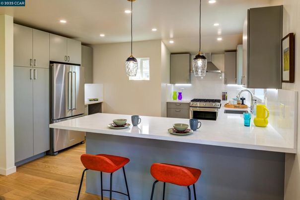Interior, Kitchen, Pendant Lights, Recessed Lighting, Stainless Steel Appliances, Wood Texture Flooring