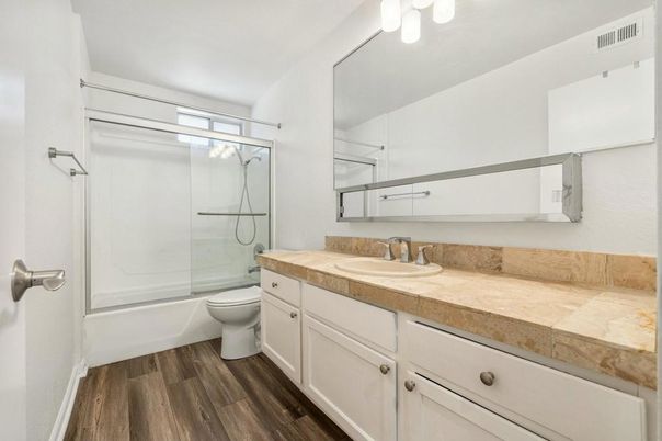Bathroom, Glass Shower, Interior, Tile Countertops, Wood Texture Flooring