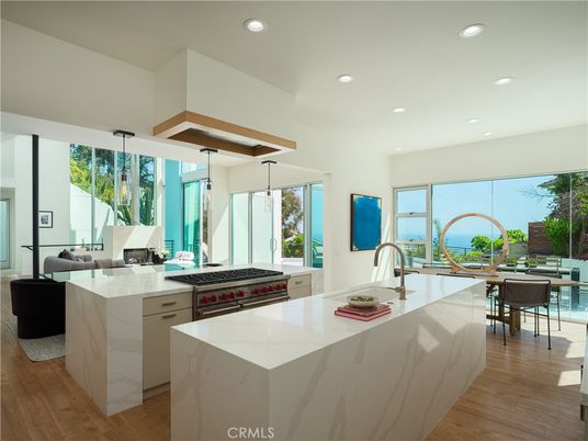Dining room, Interior, Kitchen, Pendant Lights, Recessed Lighting, Stainless Steel Appliances, Water, Wood Texture Flooring