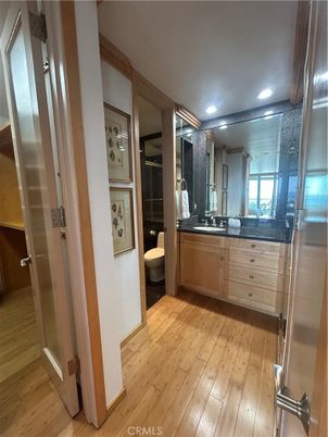 Bathroom, Dual Sink Vanities, Interior, Recessed Lighting, Wood Texture Flooring