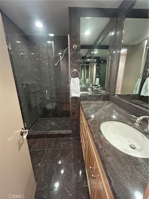 Bathroom, Dual Sink Vanities, Glass Shower, Interior, Marble, Recessed Lighting