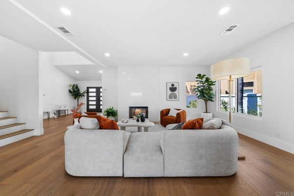 Fireplace, Interior, Living room, Marble Walls, Recessed Lighting, Wood Texture Flooring