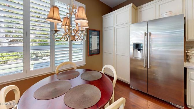 Chandelier, Dining room, Interior, Kitchen, Stainless Steel Appliances, Wood Texture Flooring