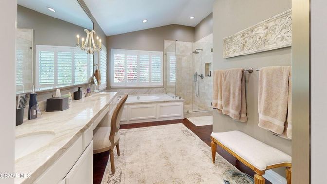 Bathroom, Chandelier, Dual Sink Vanities, Glass Shower, Interior, Recessed Lighting, Wood Texture Flooring