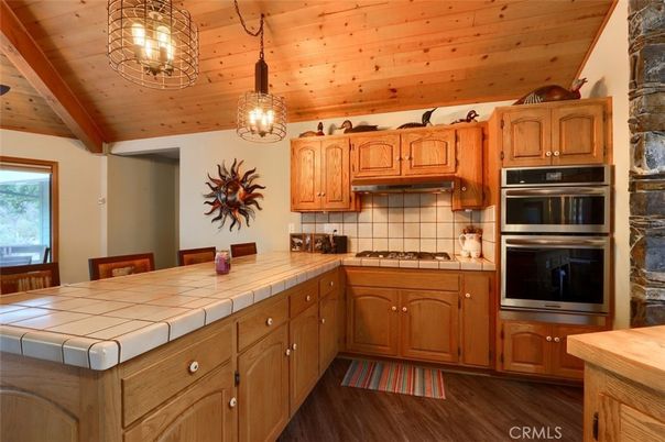 Interior, Kitchen, Pendant Lights, Tile Countertops, Wooden Ceilings, Wood Texture Flooring
