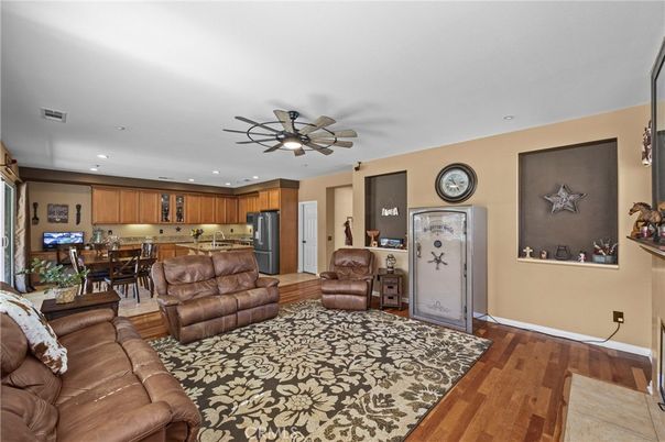 Dining room, Interior, Kitchen, Living room, Recessed Lighting, Stainless Steel Appliances, Wood Texture Flooring