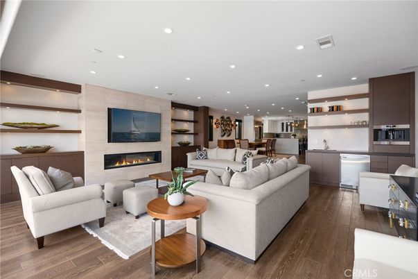 Dining room, Fireplace, Interior, Kitchen, Living room, Pendant Lights, Recessed Lighting, Stainless Steel Appliances, Wood Texture Flooring