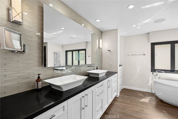 Bathroom, Dual Sink Vanities, Free Standing Baths, Interior, Recessed Lighting, Wood Texture Flooring