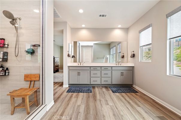 Bathroom, Dual Sink Vanities, Interior, Recessed Lighting, Wood Texture Flooring