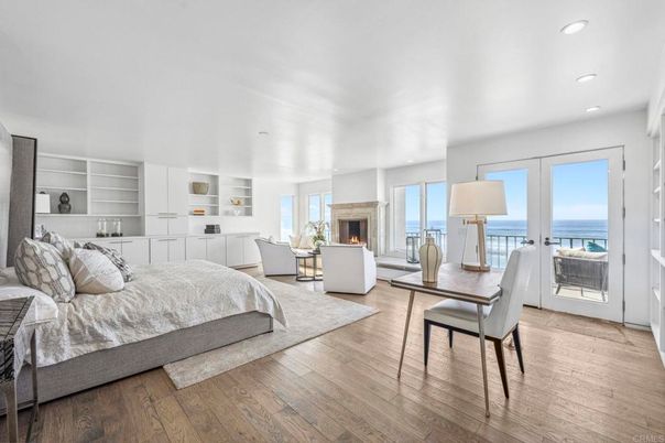 Bedroom, Dining room, Fireplace, Interior, Living room, Recessed Lighting, Water, Wood Texture Flooring