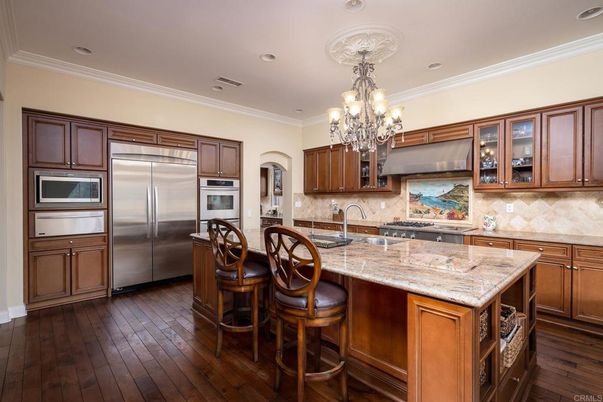 Chandelier, Interior, Kitchen, Recessed Lighting, Stainless Steel Appliances, Wood Texture Flooring